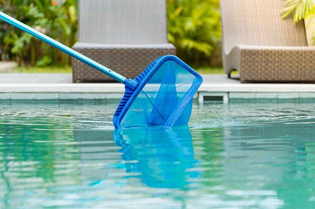 Pool Maintenance - Skimming The Pool Surface