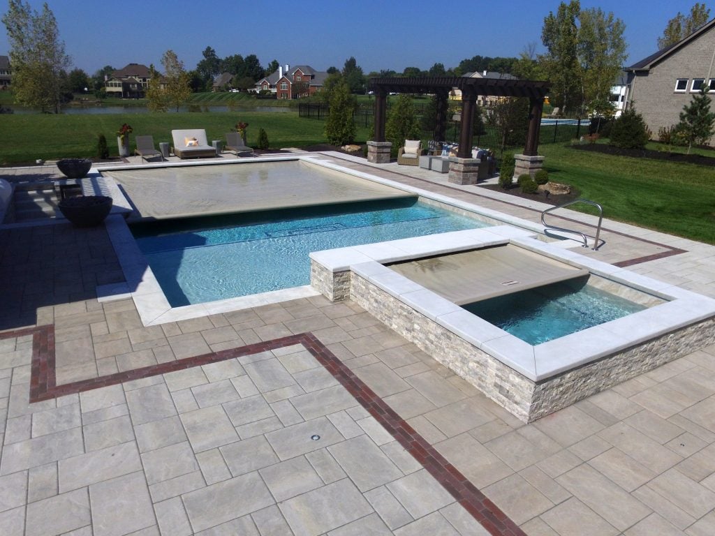 photo of a swimming pool with a Covercare pool cover