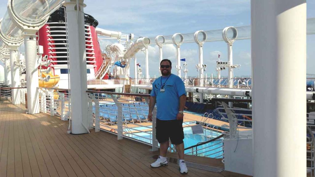 Jovaag inspecting the acrylic slide on the Disney Magic cruise ship in 2013.